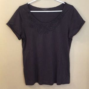 Greyish purple tshirt.